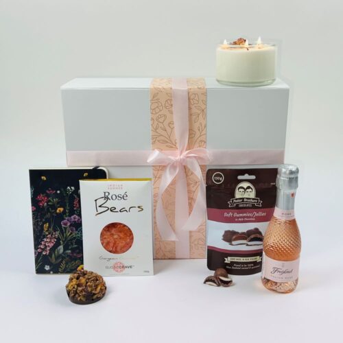 Sweet Notes is a luxury gift box for her. With a bottle of Freixenet sparkling italian rose, a beautiful notebook, rose bubbly bears, a stunning three wick candle a bag of Potter Brother's chocolate and a chocolate nut bar. All presented in a stunning gift box. Gifts for You & Me