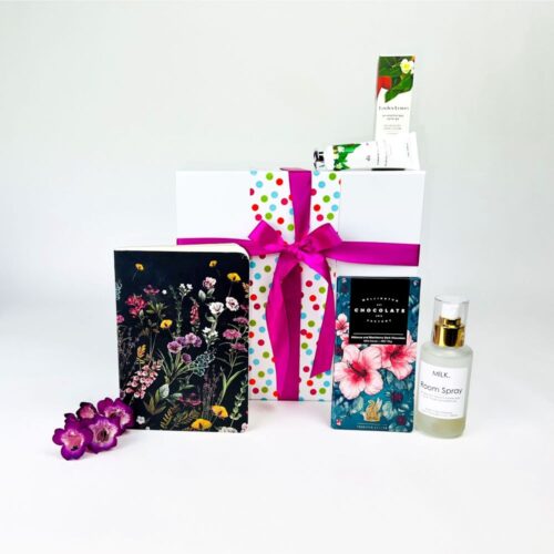 The Floral Bouquet gift hamper is the perfect gift box for women. Included in the box is a gorgeous notebook, room spray, hand cream and a bar of Wellington Chocolate Factory chocolate. All packaged in a luxury gift box. Gifts for You & Me