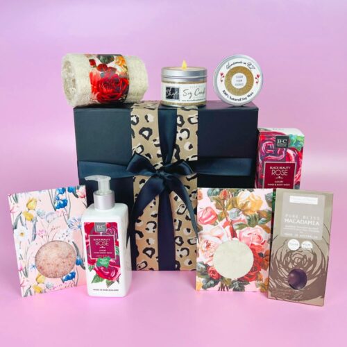 The Pure Bliss Gift Box. The contents include some bath salts, clay mask, chocolate macadmias, a candle, gorgeous body wash and a loofah. A great gift box for her. Gifts for You & Me.