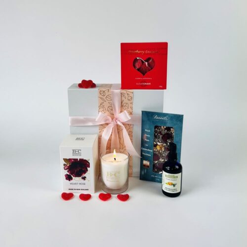 The simply romance gift box is the perfect gift hamper for couples. Including a bottle of massage oil, gummy heart lollies, a beautiful candle and a bar of plum & hazelnut chocolate. Gifts for You & Me