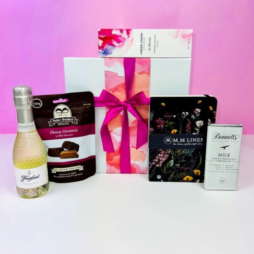 Little Luxuries is a great gift hamper for women. It contains a Linden Leaves room diffuser, a MM Linen Notebook, a bottle of Freixenet Prosecco, Potter Brothers Chocolates and a bar of Bennetts of Mangawhai chocolate. Gift Baskets NZ. Gifts for You & Me.