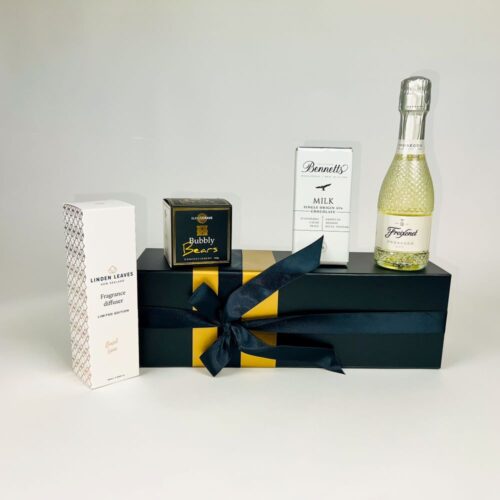 The White Diamonds Gift Box. A bottle of Freixenet Prosecco, gummy bubbly bears, a fragrant room diffuser and a bar of Bennetts of Mangawhai chocolate. Luxury gift baskets NZ. Gifts for You & Me
