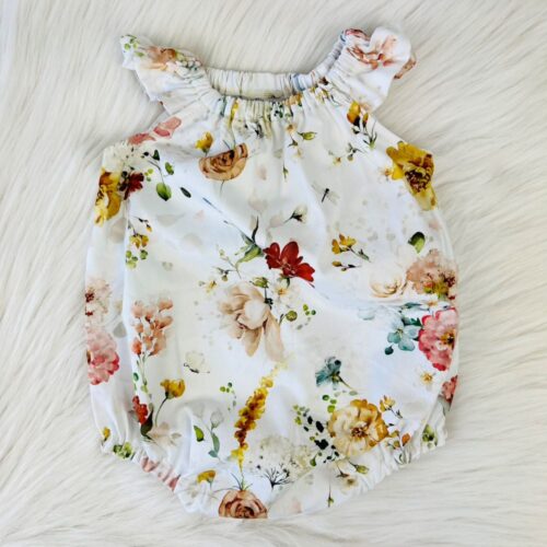 White and floral onesie for a baby girl. Baby shower gifts, baby gifts nz.