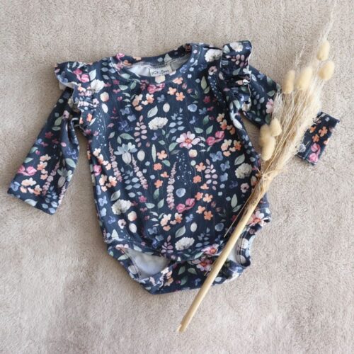 Peach & Poppy Long Sleeved Onesie. Navy floral pattern.